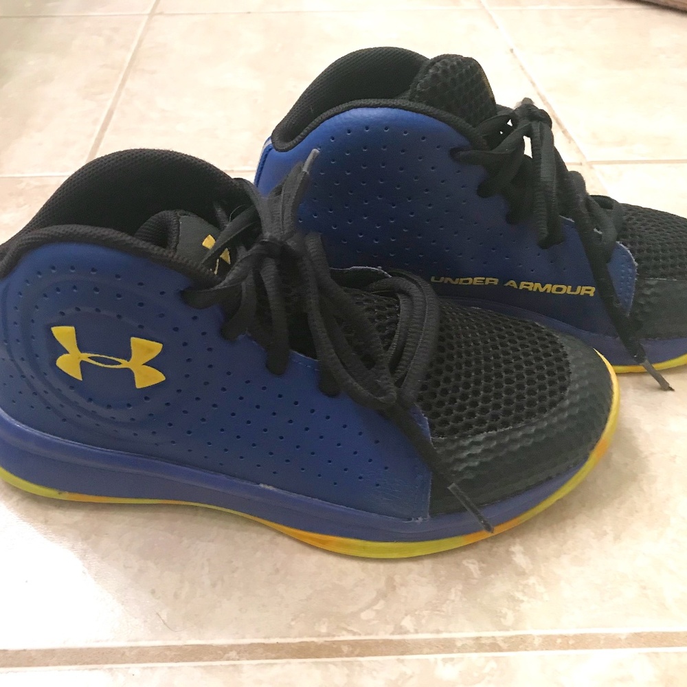 Under Armour Boys tennis shoe Size 1 US royal blue and yellow